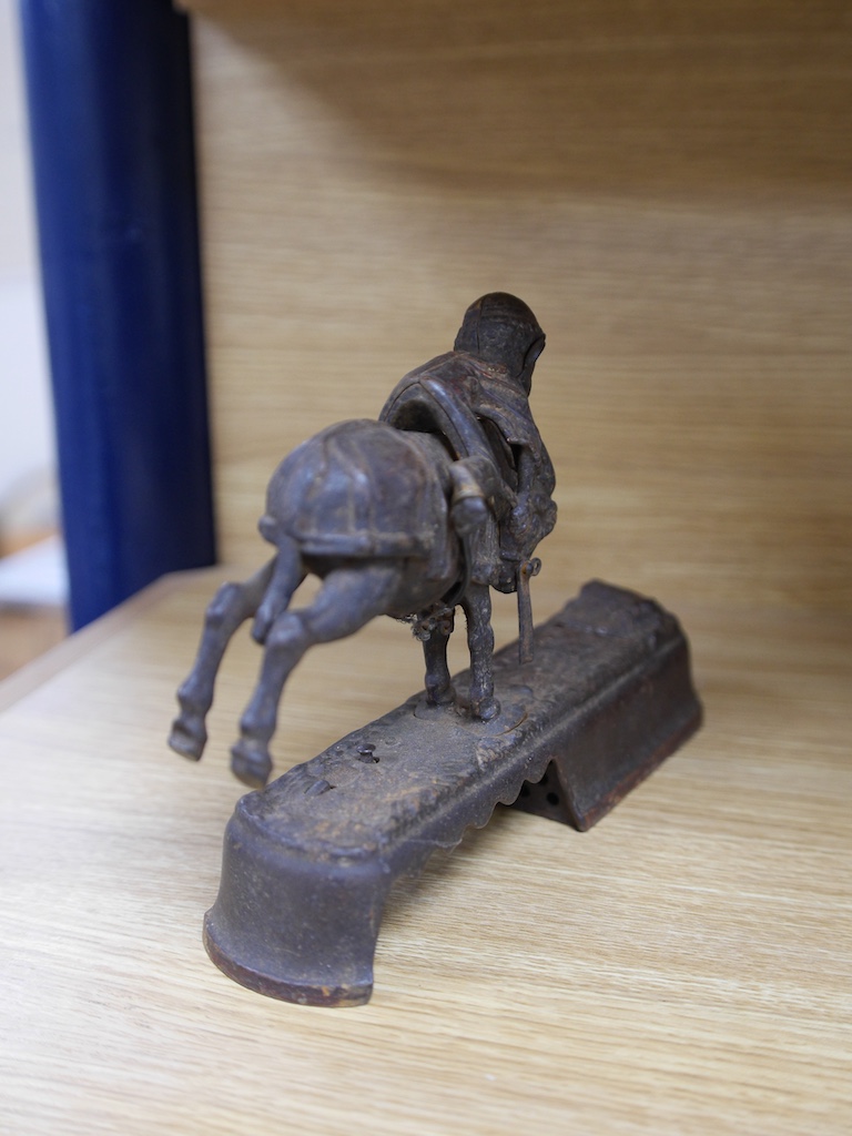 An American novelty cast iron money bank, ‘Always did ‘spise a mule’, 25cm wide. Condition - poor to fair